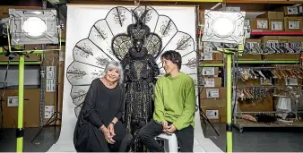  ?? BRADEN FASTIER/STUFF ?? Dame Suzie Moncrieff and the new owner of World of Wearable Art, Hideaki Fukutake, at the WOW facility in Nelson.