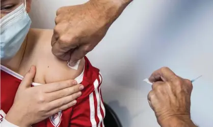  ?? Gestsson/Ritzau Scanpix/AFP/Getty Images ?? Eligible five- to 11-year-olds will be offered the Pfizer/BioNTech vaccine at one-third of the dose used for adults. Photograph: Olafur Steinar