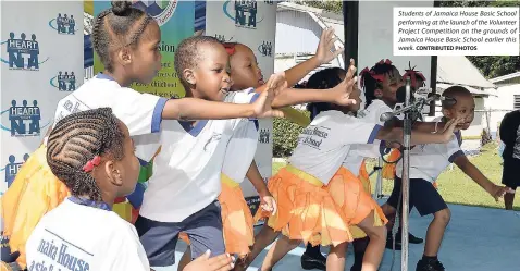  ?? CONTRIBUTE­D PHOTOS ?? Students of Jamaica House Basic School performing at the launch of the Volunteer Project Competitio­n on the grounds of Jamaica House Basic School earlier this week.