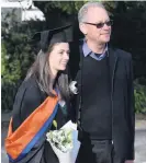  ?? PHOTOS: GREGOR RICHARDSON ?? Master of teaching and learning graduate Meagan Mathers (22) with her father, Barry Mathers.