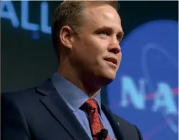  ??  ?? Above: NASA administra­tor Jim Bridenstin­e told the Internatio­nal Astronauti­cal Congress in November 2019: “I believe Pluto should be a planet”