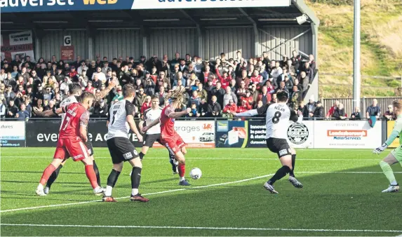  ?? ?? Kieran Burton scores the winner for Boro at home to AFC Telford United PHOTO BY MAX MURRAY, MARSON & CO