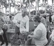  ?? SAM NAVARRO Special for the Miami Herald ?? Derek Jeter, shown during the Marlins’ Thanksgivi­ng food event, says of the coronaviru­s initiative: ‘We wanted to provide direct support to our local community.’
