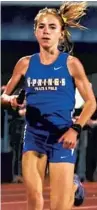  ?? SAM THOMAS/ORLANDO SENTINEL ?? Winter Springs junior Caroline Wells broke her own Florida high school record for the girls 3,200-meter run on Friday.
