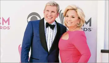  ?? Jordan Strauss / Associated Press ?? A federal trial for reality TV couple Todd and Julie Chrisley on charges including bank fraud and tax evasion is set to start Monday in Atlanta.