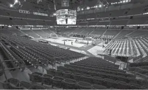  ?? ASSOCIATED PRESS ?? The Kohl Center seats will be empty again Wednesday. Now the question is whether the Louisville Cardinals will be there to face Wisconsin.