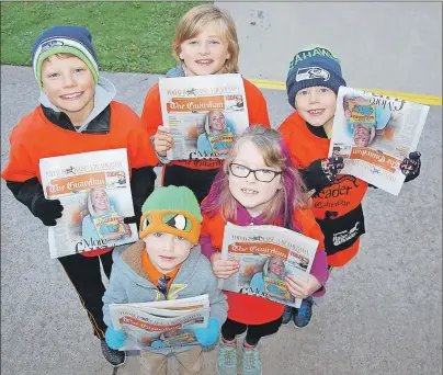  ?? JIM DAY/TC MEDIA ?? Many public servants heading to work in provincial offices in Charlottet­own Wednesday morning were greeted by these young, friendly faces out helping collect money for Raise-a-Reader. Back row, from left, are Liam Hatfield, Charlie Ross and Zachary...