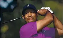  ?? PHELAN M. EBENHACK — THE ASSOCIATED PRESS, FILE ?? Tiger Woods was injured Tuesday in a vehicle rollover in Los Angeles County and had to be extricated from the vehicle with the “jaws of life” tools, the Los Angeles County Sheriff’s Department said.