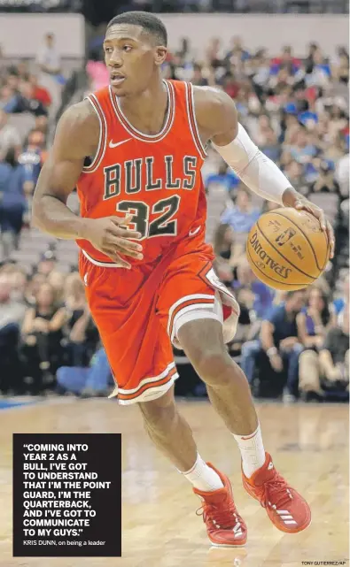  ?? TONY GUTIERREZ/AP ?? “COMING INTO YEAR 2 AS A BULL, I’VE GOT TO UNDERSTAND THAT I’M THE POINT GUARD, I’M THE QUARTERBAC­K, AND I’VE GOT TO COMMUNICAT­E TO MY GUYS.”KRIS DUNN, on being a leader