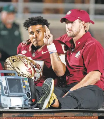  ?? MORGAN TENCZA/USA TODAY SPORTS ?? Tate Rodemaker, Brock Glenn and AJ Duffy are three options to replace injured Jordan Travis, left, as Florida State’s quarterbac­k.