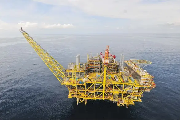  ?? HUSKY ENERGY ?? Husky Energy’s Liwan offshore production platform in the South China Sea. The Calgary-based oil and gas producer plans to spend between $2.9 billion and $3.1 billion in 2018 on two new heavy oil projects, new wells at its properties offshore...