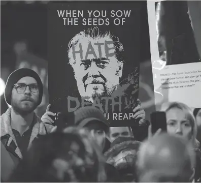  ?? CHRISTOPHE­R KATSAROV / THE CANADIAN PRESS FILES ?? Protesters demonstrat­e outside a Munk debate featuring Steve Bannon and David Frum in Toronto last Friday.