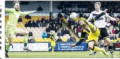  ??  ?? OVER YOUR HEAD: Mason Bennett has an acrobatic attempt at goal