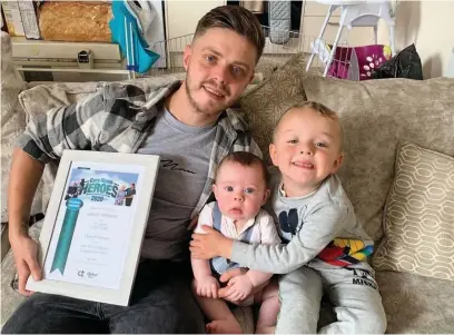  ??  ?? Carer Jordan Williams with his sons, 3-year-old Kayden and new arrival Jacob.