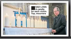  ??  ?? SAD LOSS: A candle for each victim. Top, mourners