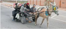  ?? | Reuters ?? PALESTINIA­NS fleeing north Gaza after Israeli troops raided Al Shifa hospital, move southward, amid the Israel-Hamas, conflict, in the central Gaza Strip yesterday.