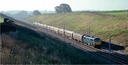  ?? BRAD JOYCE ?? Making its West Coast Railway debut, Class 86 No. 86401 Mons Meg passes Searchligh­t Lane, near Norton Bridge, hauling a Northern Belle charter from Coventry to Carlisle on October 7.