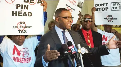  ??  ?? Cook County Board Commission­er Richard Boykin speaks at a press conference in opposition to a proposed amusement tax that would increase taxes levied on entertainm­ent services, including bowling and cable television.