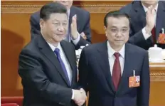  ?? — Reuters ?? Chinese Premier Li Keqiang with President Xi Jinping, after he is voted as the premier for another term.