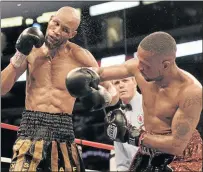  ?? Picture: FILE ?? BACK IN THE DAY: Ali ‘Rush Hour’ Funeka, left, faces Nate ‘Galaxxy Warrior’ Campbell in 2009