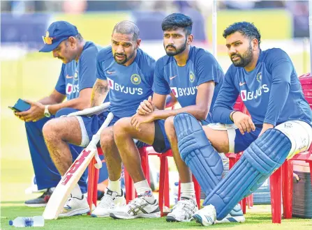  ??  ?? RIGHT TO LEFT: Rohit Sharma, Khaleel Ahmad, Shikhar Dhawan and Coach Ravi Shastri during one of the practice sessions recently