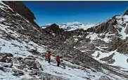  ?? Inyo County Sheriff's Office ?? Searchers are seen on Mount Whitney, where the bodies of two missing climbers were found this week.