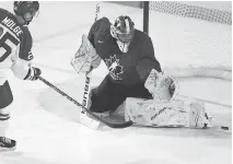  ?? PETER POWER/THE CANADIAN PRESS ?? Michael DiPietro, making a save against Denmark’s Magnus Molge during exhibition play Friday in St. Catharines, Ont., was the biggest omission when Canada announced its roster.