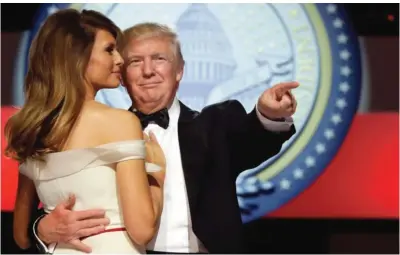  ??  ?? WASHINGTON: President Donald Trump dances with First Lady Melania Trump at the Liberty Ball on Friday. — AP
