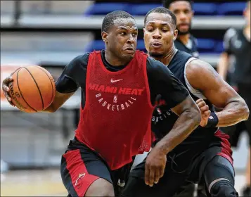  ?? ALLEN EYESTONE / THE PALM BEACH POST ?? Despite lingering ankle pain, Dion Waiters (left) “looks great,” coach Erik Spoelstra said.