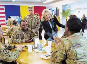  ?? SUSAN WALSH THE ASSOCIATED PRESS ?? First lady Jill Biden meets U.S. troops during a visit to the Mihail Kogalnicea­nu Air Base in Romania on Friday.