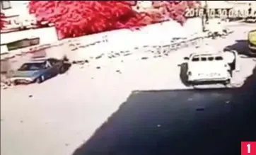  ??  ?? 1 CCTV footage in a street in Al-Hurriyah, Baghdad, from 2016 shows a man parking a car (left), before walking away and getting into a truck (right) that drives away