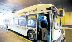  ?? BOB TYMCZYSZYN/POSTMEDIA FILE PHOTO ?? A passenger gets on a Niagara Region Transit bus at the downtown terminal in St. Catharines in this file photo.