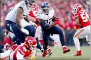  ?? JEFF ROBERSON — THE ASSOCIATED PRESS ?? The Titans’ Derrick Henry runs during the first half of the AFC Championsh­ip football game against the Chiefs on Jan. 19in Kansas City, Mo.