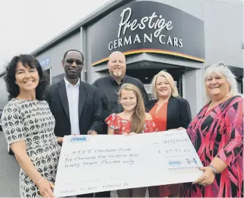  ??  ?? Prestige German Cars’ fundraiser for the children’s diabetes unit. Emily is pictured centre and inset.