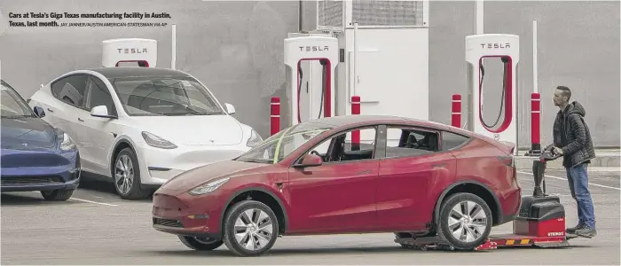  ?? JAY JANNER/AUSTIN AMERICAN-STATESMAN VIA AP ?? Cars at Tesla’s Giga Texas manufactur­ing facility in Austin, Texas, last month.