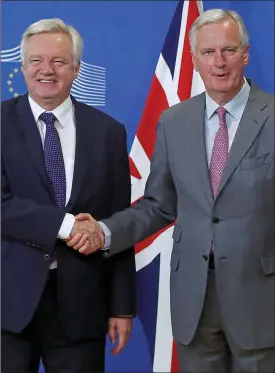 ??  ?? In for the long haul: Brexit Secretary David Davis and EU negotiator Michel Barnier have much work to do in the Brexit talks