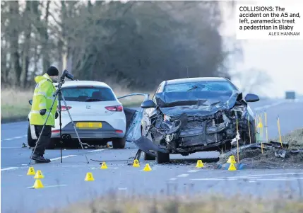  ?? ALEX HANNAM ?? COLLISIONS: The accident on the A5 and, left, paramedics treat a pedestrian in Blaby