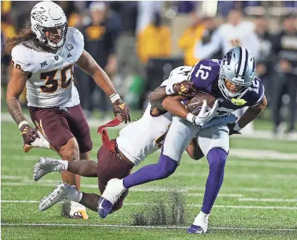 Wildcats get lift from backup receivers, running back - PressReader