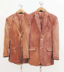  ?? Provided by David B. Smith Gallery ?? Adam Milner’s “Weak Container” features two suits dyed with blood.