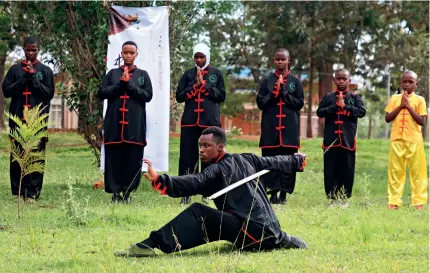  ?? ?? Members of a local wushu club perform in Kayonza, Eastern Province, Rwanda, on 12 November 2021