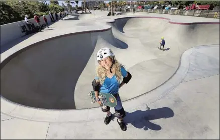  ?? Allen J. Schaben Los Angeles Times ?? SKATEBOARD­ER Barbara Odanaka tries out Huntington Beach’s Vans Off the Wall Skatepark as part of her summer journey.