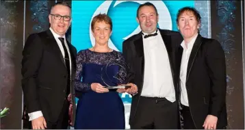  ??  ?? Mary and Pat O’Neill receive their Small Producer of the Year Award at the Irish Quality Food Awards.