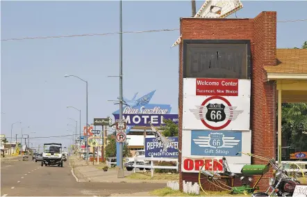  ?? THOM COLE/THE NEW MEXICAN ?? The town of Tucumcari is best known for its section of historic Route 66 and the motor inns along the road. But Kmart and other businesses along the route have been boarded up in recent years, a sign of Tucumcari’s economic struggles.