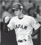  ??  ?? Japanese star Shohei Ohtani intends to be a starting pitcher and an everyday power hitter in the majors.