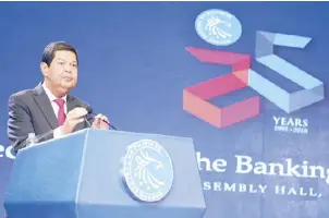  ??  ?? BSP Gov. Nestor Espenilla Jr. delivers his keynote address during the reception for the banking community as the central bank celebrated its 25th anniversar­y last Friday.