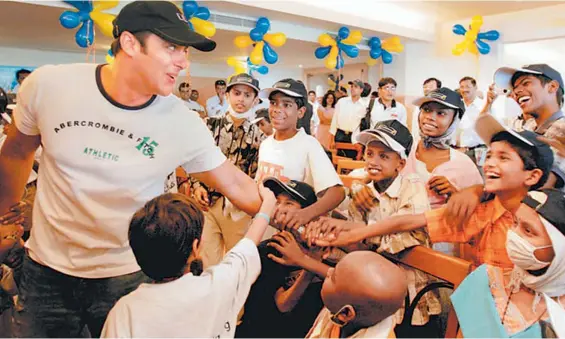  ??  ?? Salman Khan spends time with young cancer patients in an awareness event