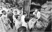  ??  ?? People queue up to purchase onions at subsidised rates at Krishi Bhawan. Prices have soared over the past month