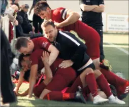  ?? Picture: Ian Ralphs ?? City manager Ben Smith and his players celebrate their 94th minute winner against Sutton Common Rovers