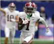  ?? THE ASSOCIATED PRESS FILE PHOTO ?? Alabama wide receiver Jameson Williams (1) scores a touchdown against Miami during a game last year in Atlanta.