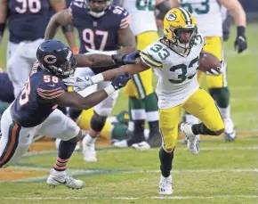  ??  ?? Running back Aaron Jones could yield a second-round pick in a trade if the Packers use the franchise tag on him.